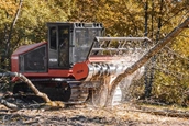 Bull Hog Tractor working with trees